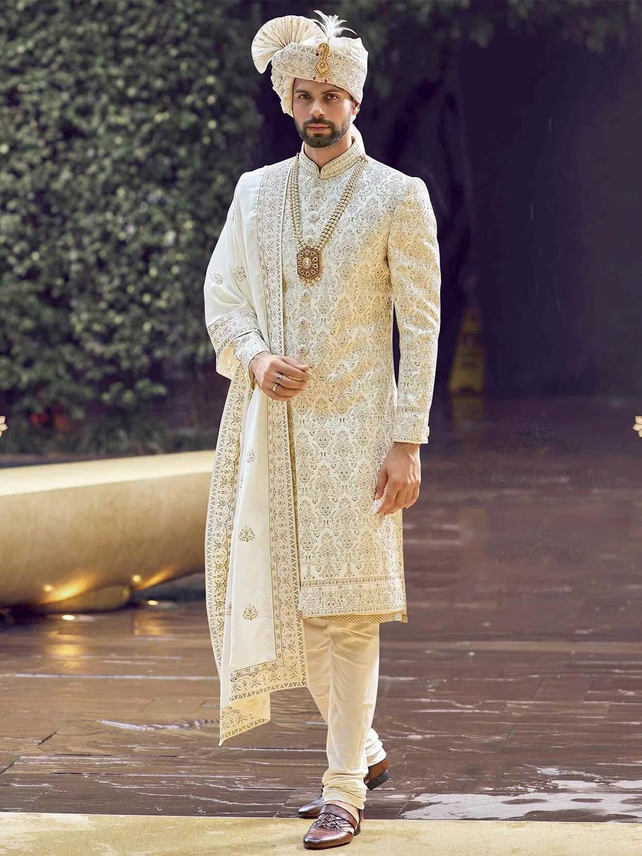a-silky-white-groom-sherwani-for-wedding-with-black-stone